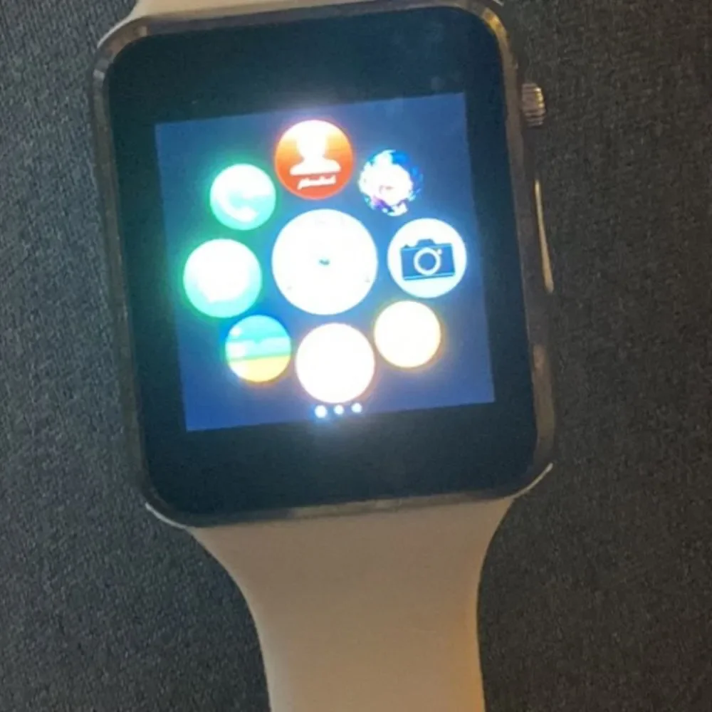 White Smart watch with camera facebook connect, email, text, and music